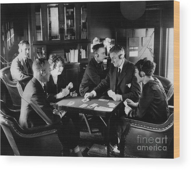 Mid Adult Women Wood Print featuring the photograph Men And Women Playing Bridge by Bettmann
