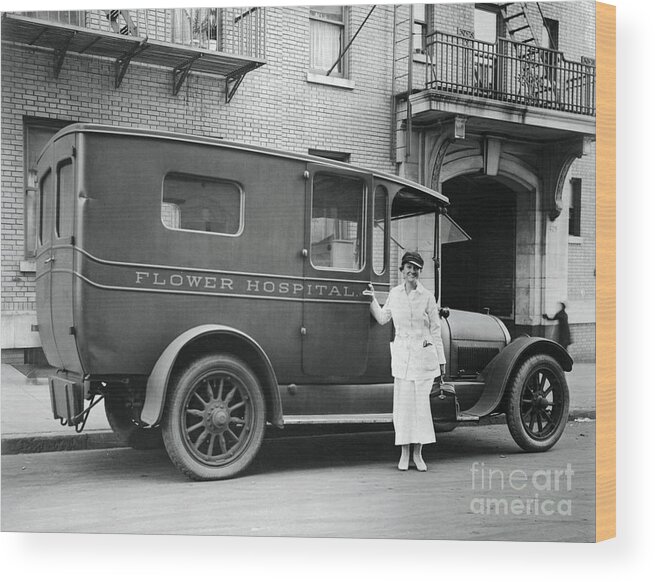 Ambulance Wood Print featuring the photograph Nurse Standing By Flower Hospital by Bettmann