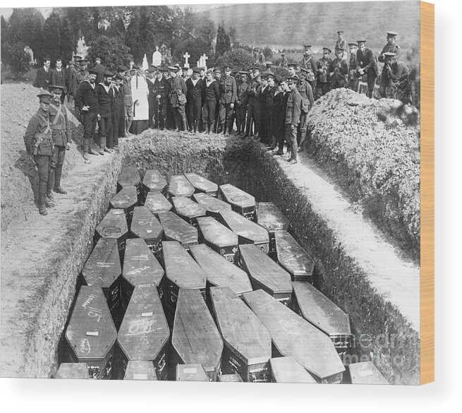 People Wood Print featuring the photograph Paying Last Respects At Common Grave by Bettmann