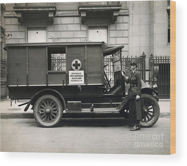 Ambulance Wood Print featuring the photograph Red Cross Ambulance by Bettmann