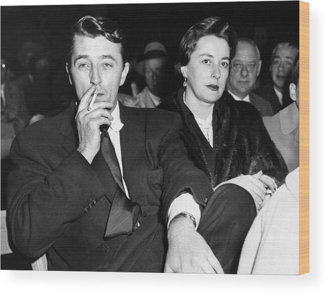 American League Baseball Wood Print featuring the photograph Robert Mitchum And His Wife, Dorothy by New York Daily News Archive