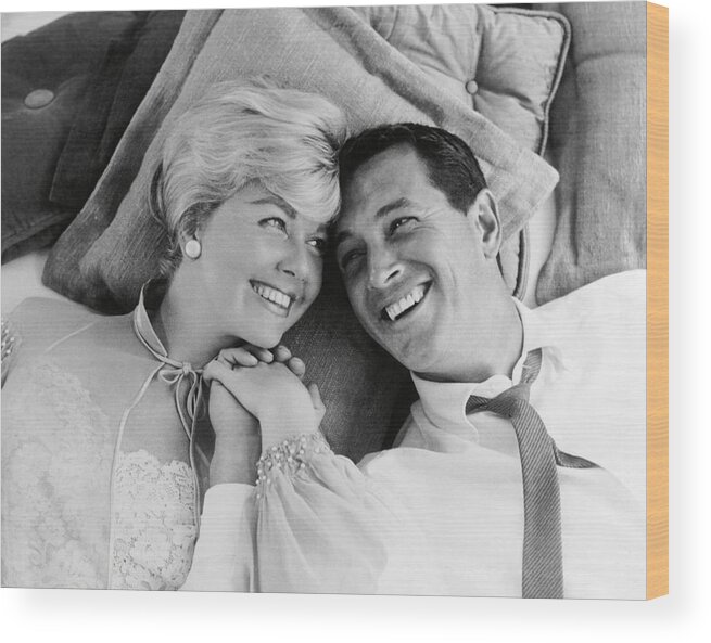 Doris Day Wood Print featuring the photograph ROCK HUDSON and DORIS DAY in PILLOW TALK -1959-. by Album