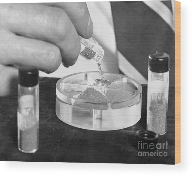 People Wood Print featuring the photograph Scientist Pouring Manmade Diamonds by Bettmann