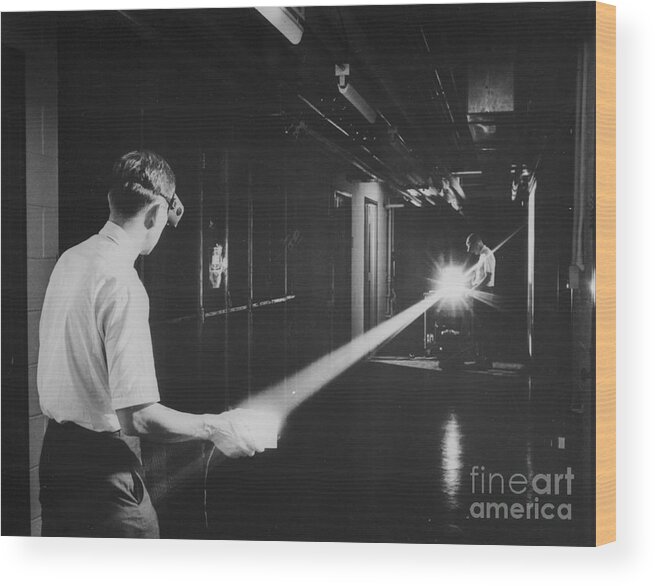 People Wood Print featuring the photograph Scientists Measuring Argon Gas Laser by Bettmann