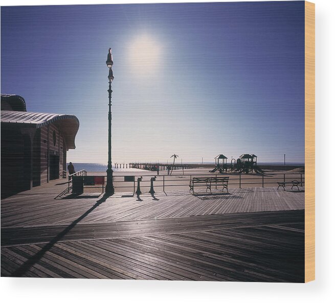 Amusement Park Wood Print featuring the photograph Sea View With Morning Sunlight Hitting by Eschcollection
