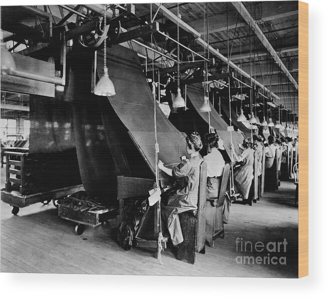 People Wood Print featuring the photograph Textiles Being Examined Before Shipment by Bettmann