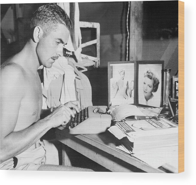 Tyrone Power Wood Print featuring the photograph Tyrone Power Typing A Letter by Bettmann