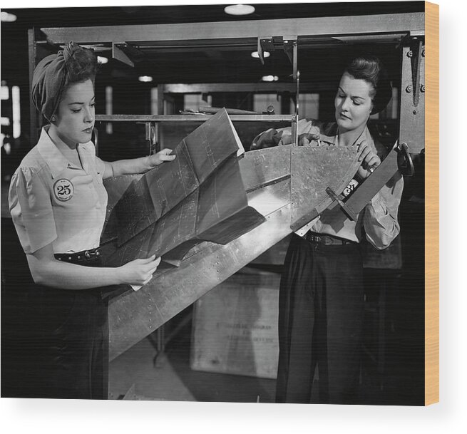 Three Quarter Length Wood Print featuring the photograph Women Working In Factory by George Marks