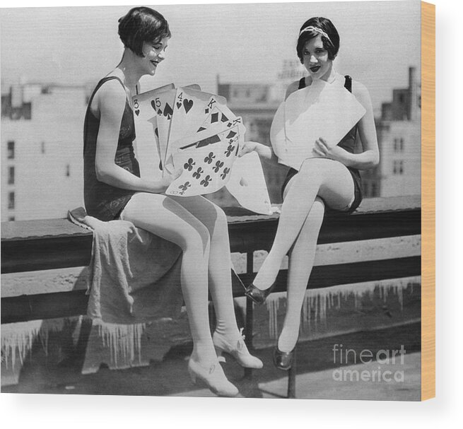 People Wood Print featuring the photograph Yong Smiling Women Playing Big Cards by Bettmann