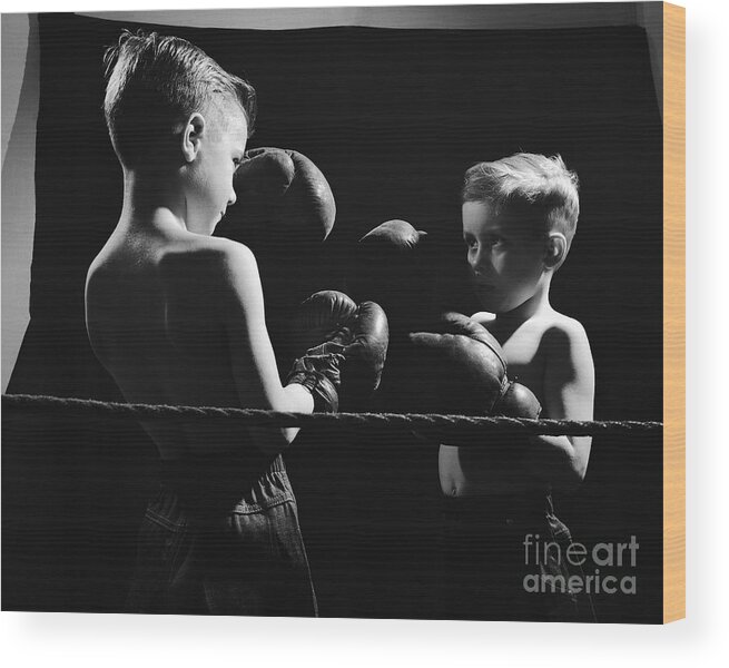Child Wood Print featuring the photograph Young Brothers Boxing by Bettmann