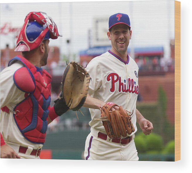 Baseball Catcher Wood Print featuring the photograph Cliff Lee and Wil Nieves by Mitchell Leff