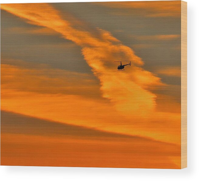 Helicopter Wood Print featuring the photograph Helicopter Approaching at Sunset by Linda Stern