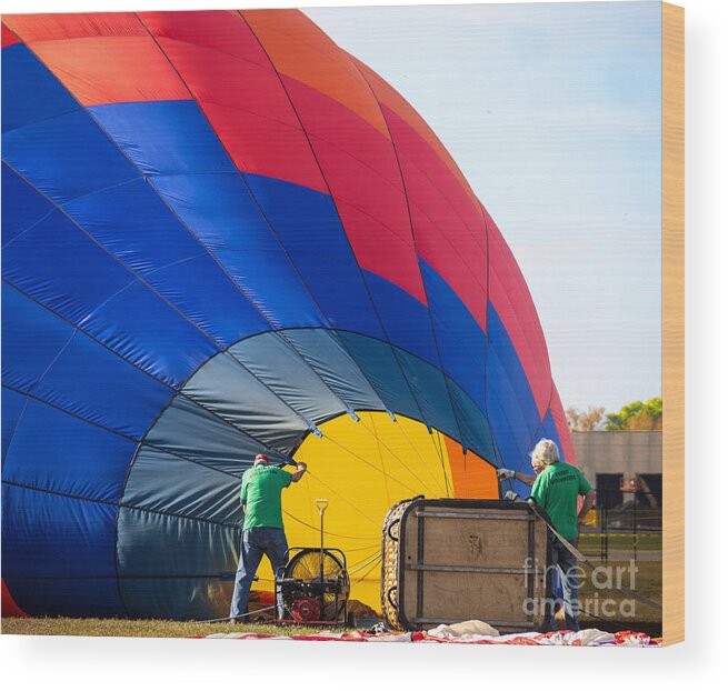 Hot Air Balloons Wood Print featuring the photograph Preparing the Balloon for the Up Up And Away Florida Hot Air Ballon Festival by L Bosco