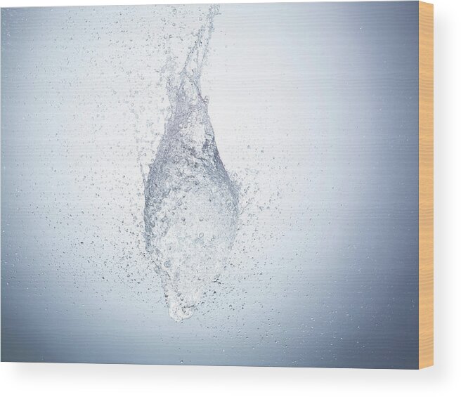 Motion Wood Print featuring the photograph High Speed Image Of Water Exploding #2 by Level1studio