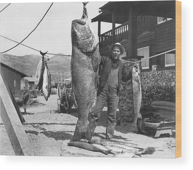 1 Person Wood Print featuring the photograph A Successful Day Of Fishing by Underwood Archives
