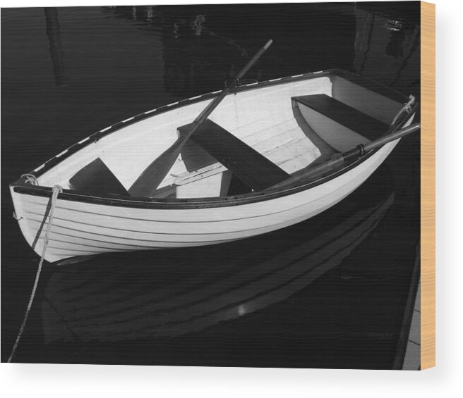 Boats Wood Print featuring the photograph A White Rowboat by Xueling Zou