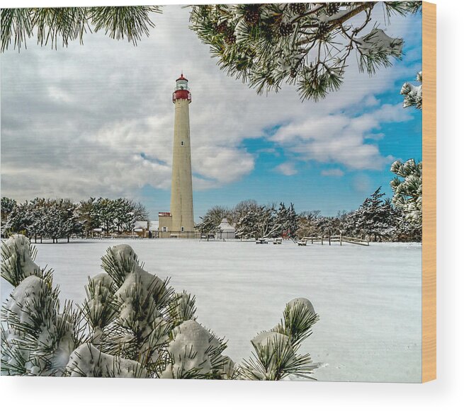 Beacon Wood Print featuring the photograph Cape May Light thru Snowy Trees by Nick Zelinsky Jr