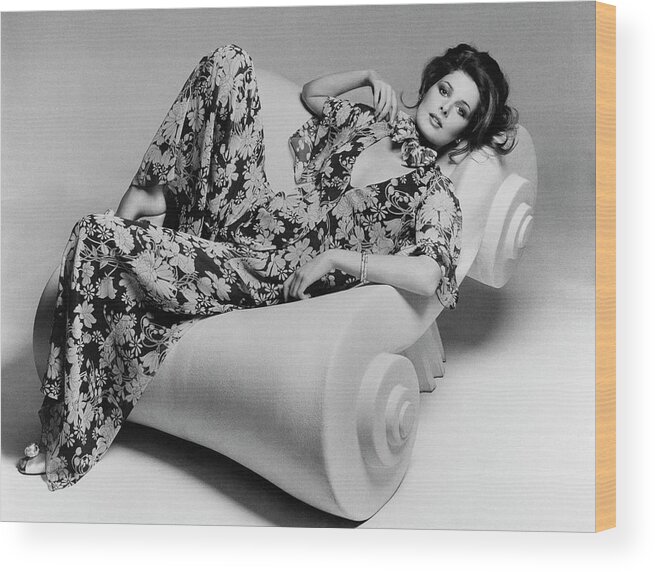 Accessories Wood Print featuring the photograph Cristina Ferrare Reclining In Chair by Francesco Scavullo
