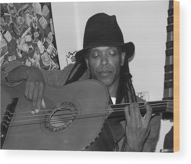 Musician Wood Print featuring the photograph Guitar Player Black Hat by Cleaster Cotton