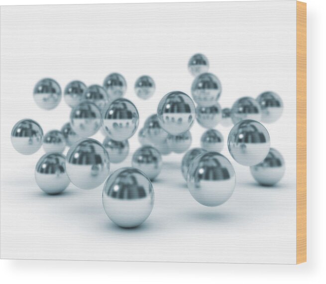 Artwork Wood Print featuring the photograph Metal Spheres by Jesper Klausen / Science Photo Library