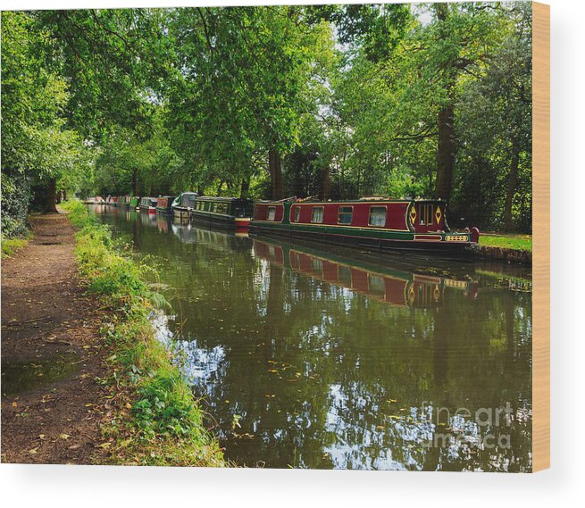 English Canal Wood Print featuring the photograph Narrowboats moored on the Wey Navigation in Surrey by Louise Heusinkveld
