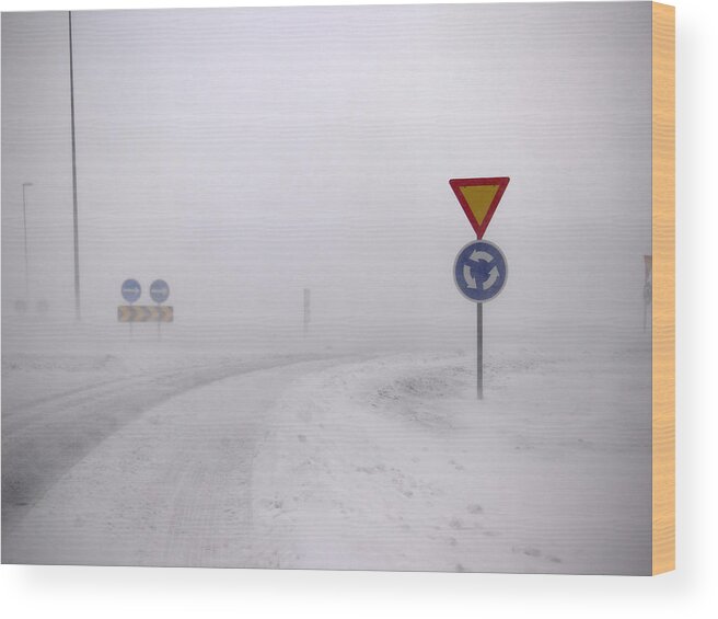 Risk Wood Print featuring the photograph Road Signs In Snowy Landscape by Kmm Productions