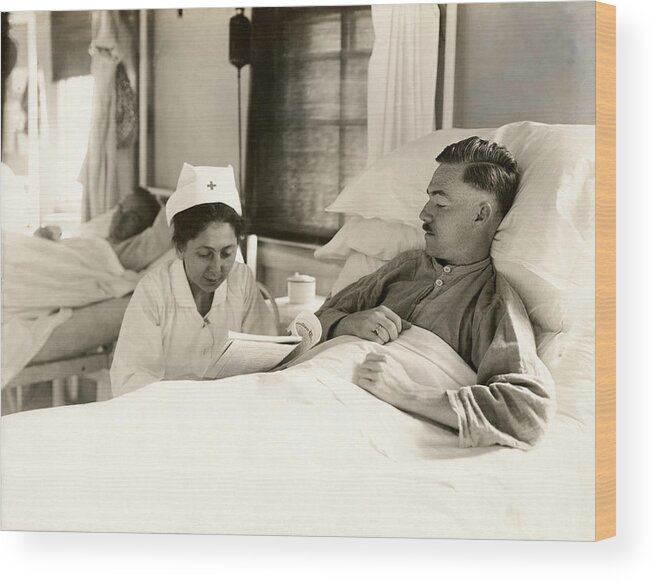 Wwi Wood Print featuring the photograph WWI Nurse Reading to Soldier by Historic Image