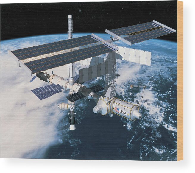 Horizontal Wood Print featuring the photograph Space Station In Orbit #1 by Stockbyte