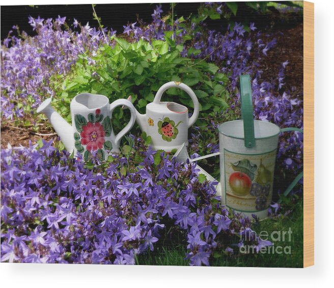 Botanical Wood Print featuring the photograph Watering cans and Campanula by Tatyana Searcy
