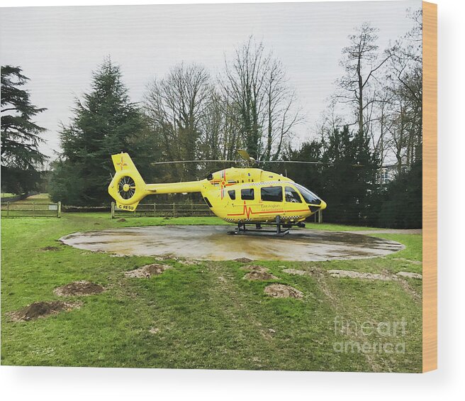 N.h.s. Wood Print featuring the photograph Air ambulance helicopter by Tom Gowanlock