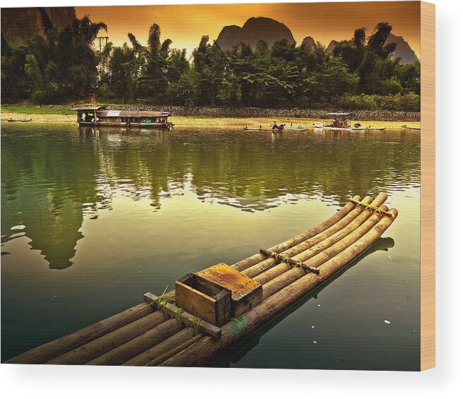 Sunset Wood Print featuring the photograph Bamboo raft preparing to cross the river-China Guilin scenery Lijiang River in Yangshuo by Artto Pan