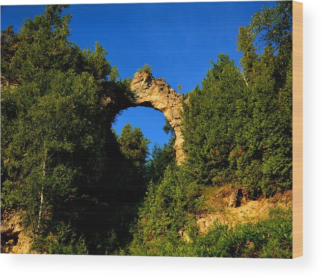 Mackinac Island Wood Print featuring the photograph Beneath Arch Rock by Keith Stokes