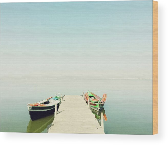 Lagoon Wood Print featuring the photograph Calm lake with two fishing boats by GoodMood Art