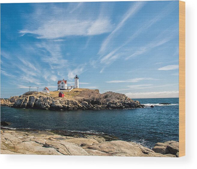 Maine Wood Print featuring the photograph Nubble Lighthouse with Dramatic Clouds by Nancy De Flon