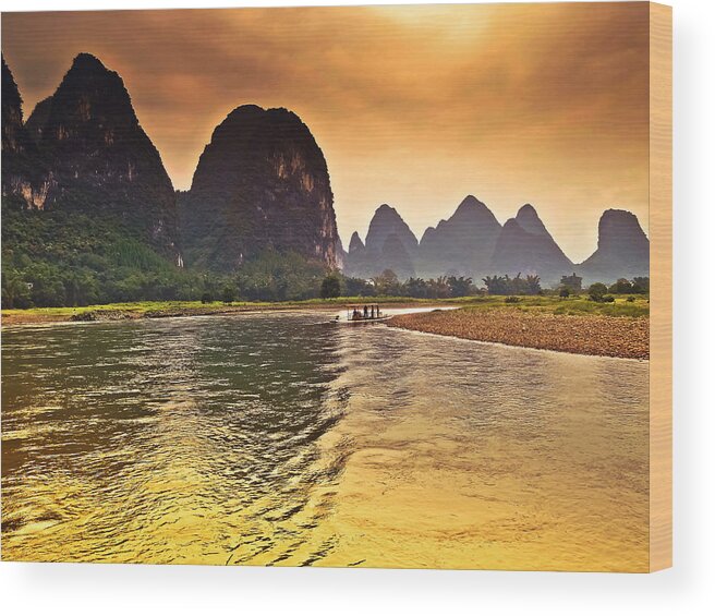 Sunset Wood Print featuring the photograph Riverside scenery like gold-China Guilin scenery Lijiang River in Yangshuo by Artto Pan