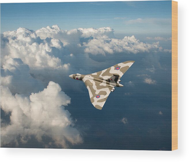 Avro Vulcan Wood Print featuring the photograph Vulcan catching the light by Gary Eason