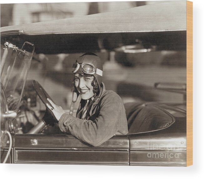 Mid Adult Women Wood Print featuring the photograph Aviatrix Ruth Elder Driving Car by Bettmann