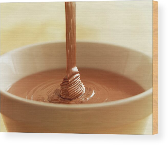 Melting Wood Print featuring the photograph Close Up Of Chocolate Syrup Pouring by Adam Gault
