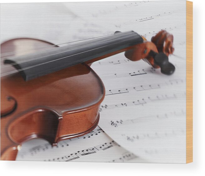 Sheet Music Wood Print featuring the photograph Close Up Of Violin And Sheet Music by Adam Gault