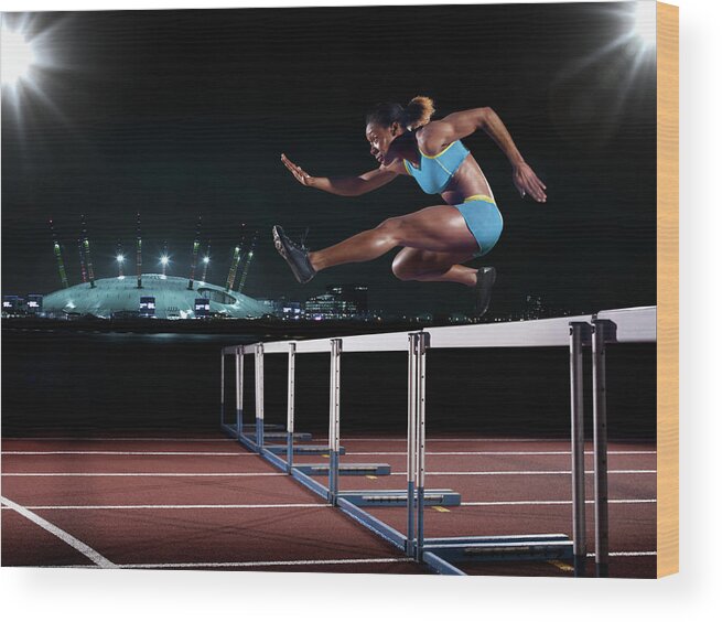 People Wood Print featuring the photograph Female Hurdling In London by Mike Harrington