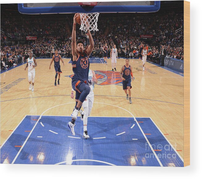Isaiah Hicks Wood Print featuring the photograph New York Knicks V Charlotte Hornets by Jesse D. Garrabrant