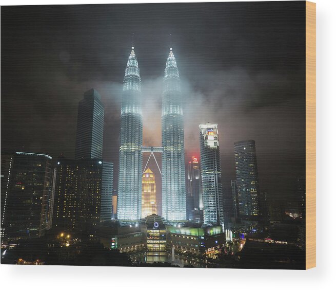 Outdoors Wood Print featuring the photograph Petronas Twin Towers And The Kuala by Travelpix Ltd