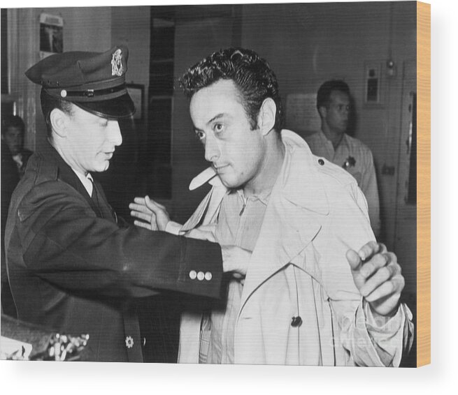People Wood Print featuring the photograph Policeman Searching Comic Lenny Bruce by Bettmann