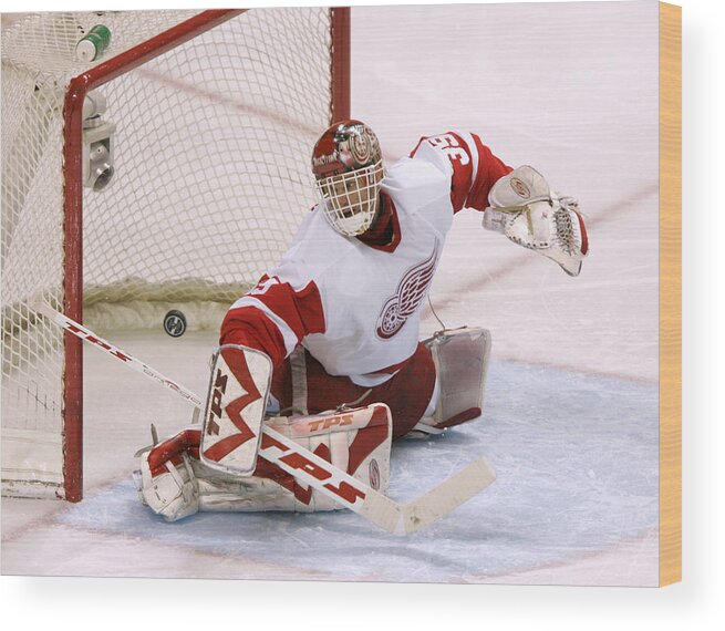 Toughness Wood Print featuring the photograph 2007 NHL Playoffs - Game Six - San Jose Sharks vs Detroit Red Wings by John Medina