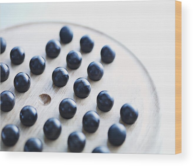Sports Ball Wood Print featuring the photograph Marbles on Chinese checkers board by Martin Barraud
