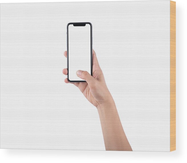 Empty Wood Print featuring the photograph Smartphone mockup. New frameless smartphone mockup with white screen. Isolated on white background. Based on high-quality studio shot. Smartphone frameless design concept. by Issarawat Tattong