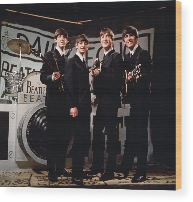 Singer Wood Print featuring the photograph Happy Beatles by Hulton Archive