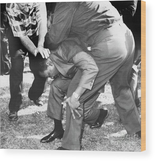 People Wood Print featuring the photograph Martin Luther King Assaulted by Bettmann