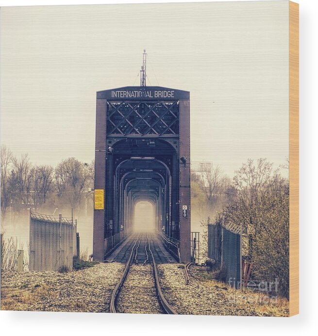  #international #usa #canada #niagarariver #716 #905 #ontario #newyork #railroad #uscustoms #canonusa #unityisland #fog #foggy #hdr #highdynamicrange #skylum #aurorahdr2019 #jimlepard.com #wanderlust #buffalove #photography #photographer #hdrfreak #hdrphotography #hdrphoto #jimlepardigitalmaging.com #jaw_dropping_shots #jaw_dropping_shotz #skylum_global Wood Print featuring the photograph The Internation Railroad Bridge by Jim Lepard