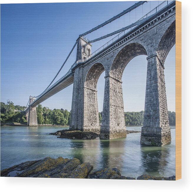 Arch Wood Print featuring the photograph The Menai Suspension Bridge, built in 1826 by Thomas Telford. by Roy JAMES Shakespeare